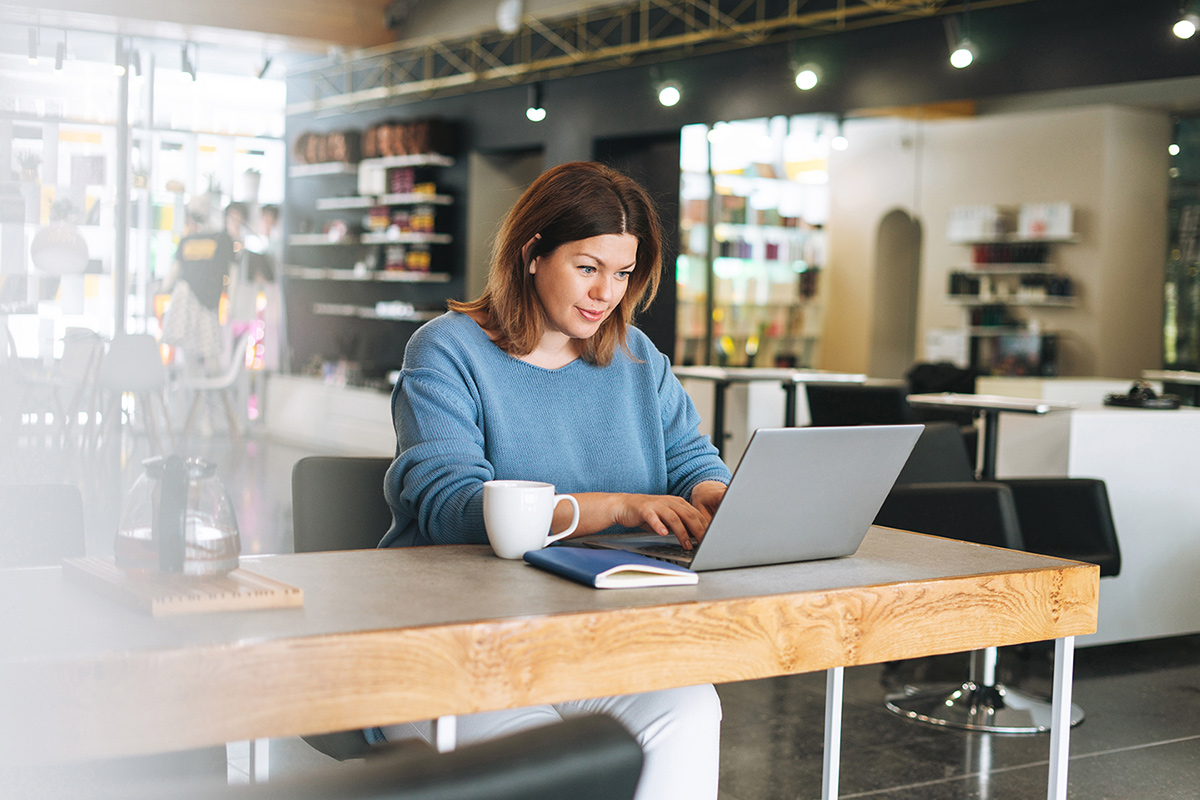 salon owner on laptop