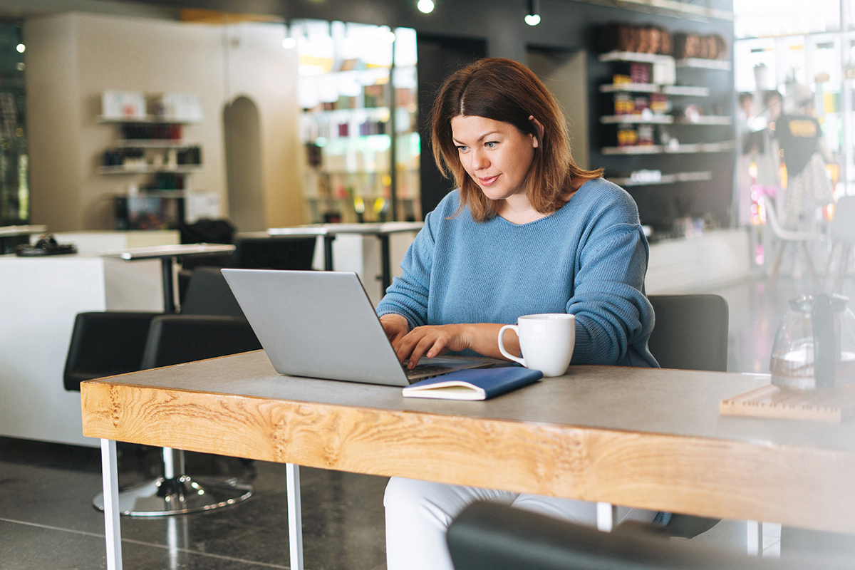 salon owner on laptop